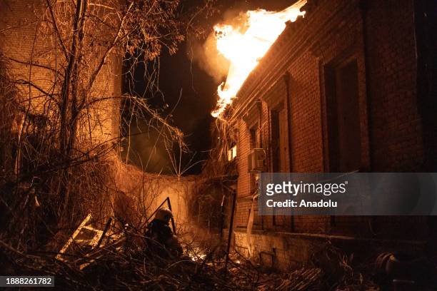 Firefighters try to extinguish the fire at the building of the SOBES Social Assistance office, which was almost completely burned down, after a...