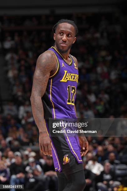 Taurean Prince of the Los Angeles Lakers looks on during the game against the Minnesota Timberwolves on December 30, 2023 at Target Center in...
