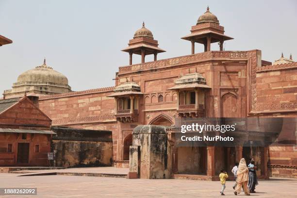 The Jodha Bai Mahal at the royal palace is being photographed in Fatehpur Sikri, Uttar Pradesh, India, on May 6, 2022. The Jodha Bai Mahal, also...