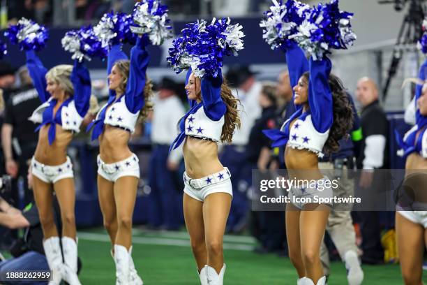 The Dallas Cowboys Cheerleaders perform during the game between the Dallas Cowboys and the Detroit Lions on December 30, 2023 at AT&T Stadium in...