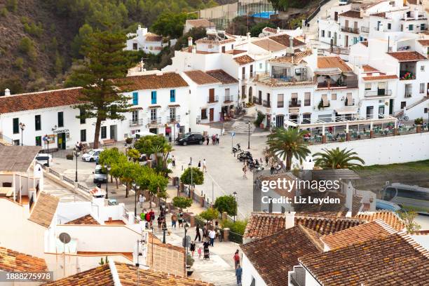elevated  view of calle real and the west side of frigiliana, spain - frigiliana stock pictures, royalty-free photos & images