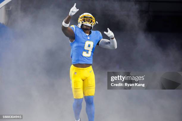 Kenneth Murray Jr. #9 of the Los Angeles Chargers celebrates as he runs onto the field during player introductions before an NFL football game...