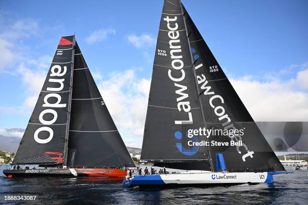 Andoo Comanche and LawConnect battle for line honours duri the 2023 Sydney to Hobart, on December 28, 2023 in Hobart, Australia.