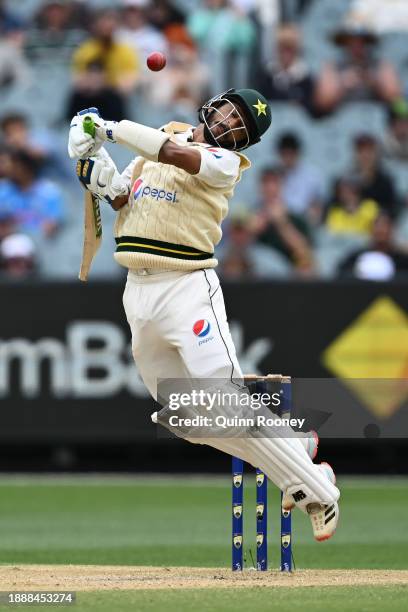 Hasan Ali of Pakistan avoids a delivery during day three of the Second Test Match between Australia and Pakistan at Melbourne Cricket Ground on...