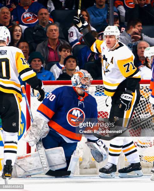 Evgeni Malkin of the Pittsburgh Penguins scores his second goal of the second period against Ilya Sorokin of the New York Islanders at UBS Arena on...