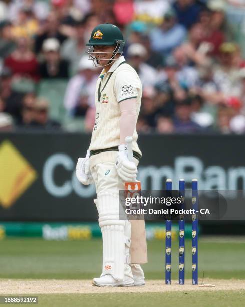 David Warner of Australia reacts after being clean bowled by Mir Hamza of Pakistan during day three of the Second Test Match between Australia and...