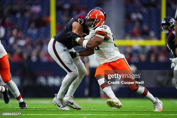 Myles Garrett of the Cleveland Browns rushes the passer during an NFL football game against the Houston Texans at NRG Stadium on December 24, 2023 in...