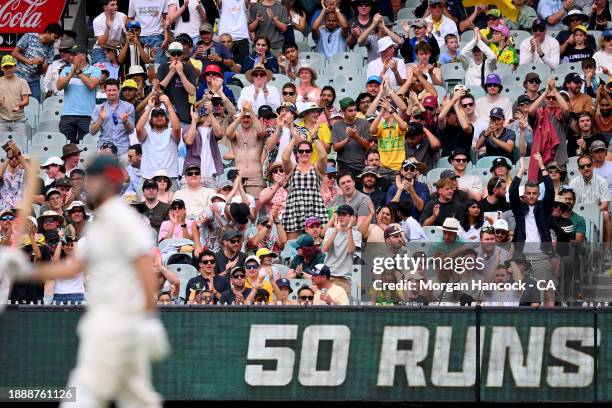 Crowds show their support as Mitch Marsh of Australia celebrates scoring 50 runs during day three of the Second Test Match between Australia and...