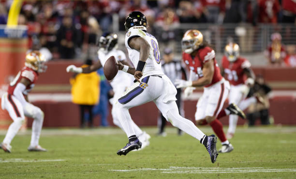 Lamar Jackson of the Baltimore Ravens rushes during the game against the San Francisco 49ers at Levi's Stadium on December 25, 2023 in Santa Clara,...