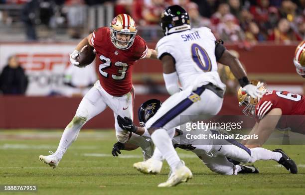 Christian McCaffrey of the San Francisco 49ers rushes during the game against the Baltimore Ravens at Levi's Stadium on December 25, 2023 in Santa...
