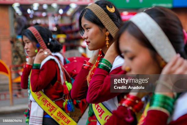 Nepalese women from the Gurung community dressed in traditional attire take part in the parade to mark the Tamu Lhosar or New Year in Kathmandu,...