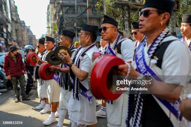 Nepalese men from the Gurung community dressed in traditional attire drums sing as they take part in the parade to mark the Tamu Lhosar or New Year...