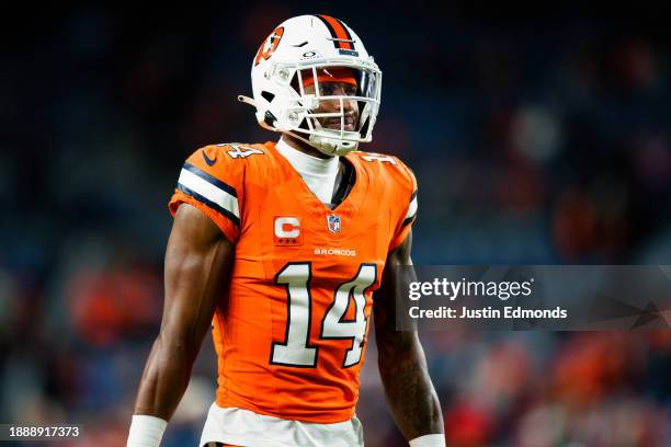 Wide receiver Courtland Sutton of the Denver Broncos walks on the field against the New England Patriots at Empower Field at Mile High on December...