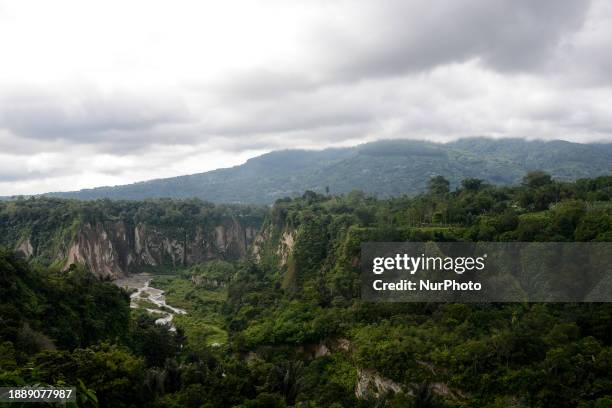 Viewing Sianok Canyon, locally known as Ngarai Sianok, in Bukittinggi, West Sumatra, Indonesia, on December 31, 2023. The canyon is a...