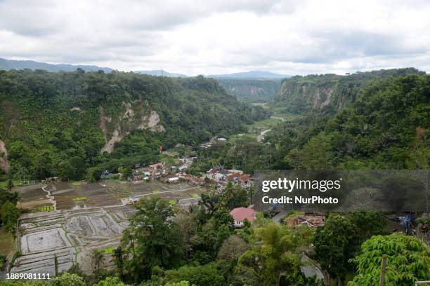 An aerial photo is showing Sianok Canyon, locally known as Ngarai Sianok, in Bukittinggi, West Sumatra, Indonesia, on December 31, 2023. The canyon...