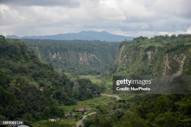 Viewing Sianok Canyon, locally known as Ngarai Sianok, in Bukittinggi, West Sumatra, Indonesia, on December 31, 2023. The canyon is a...