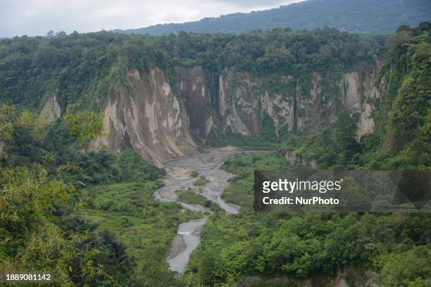 Viewing Sianok Canyon, locally known as Ngarai Sianok, in Bukittinggi, West Sumatra, Indonesia, on December 31, 2023. The canyon is a...