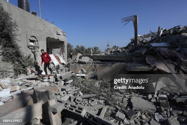 View of a collapsed building after an Israeli attack on Az-Zawayda town of Deir al-Balah, Gaza on December 31, 2023. Many buildings have been...