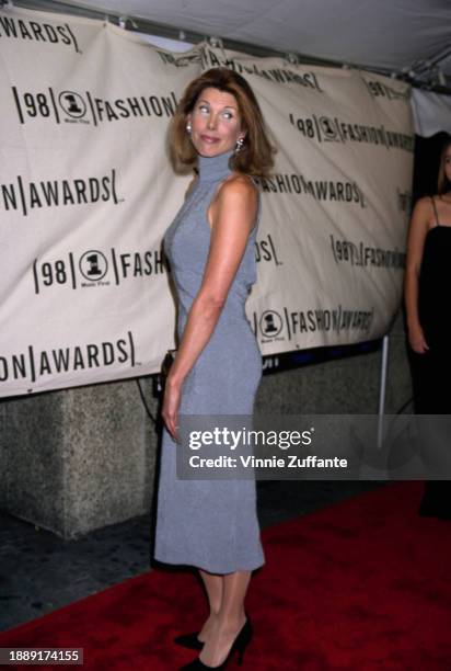 American actress and singer Christine Baranski, wearing a grey high-neck dress, attends the 1998 VH1 Fashion Awards, held at Madison Square Garden in...