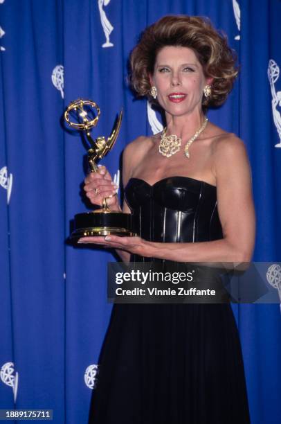 American actress and singer Christine Baranski, wearing a black off-shoulder evening gown, in the press room of the 47th Primetime Emmy Awards, held...