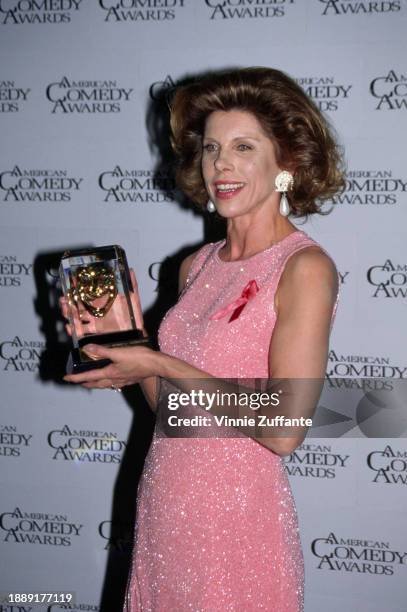 American actress and singer Christine Baranski, wearing a pink crew neck dress, attends the 10th Annual American Comedy Awards, held at the Shrine...