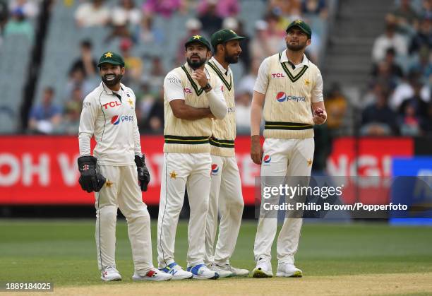 Pakistan players wait for the second session to start as the third umpire Richard Illingworth was stuck in a lift during day three of the Second Test...