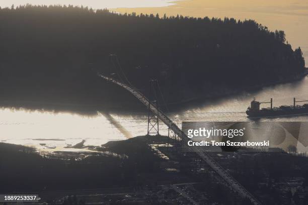 An aerial view of the Lions Gate Bridge as traffic makes its way to and from Stanley Park on January 26, 2009 in Vancouver, British Columbia, Canada.