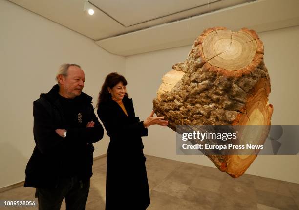 The Minister of Equality, Ana Redondo, and the artist Enrique Reche next to one of the works of his exhibition 'Arbol', at the Patio Herreriano...