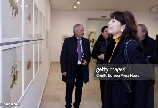 The Minister of Equality, Ana Redondo , looks at one of the works during the exhibition 'Tree' by artist Enrique Reche, at the Patio Herreriano...