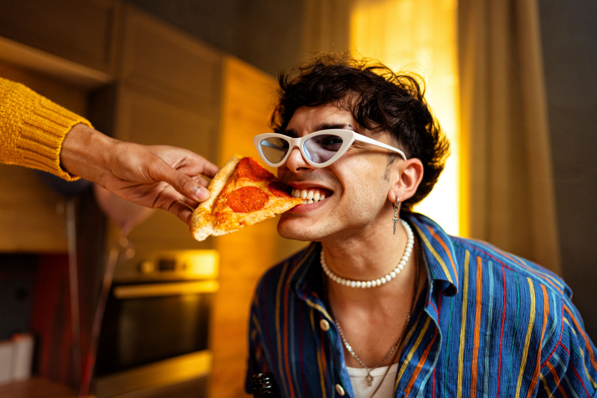 enjoying pizza