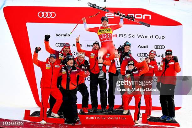 Odermatt Marco of Switzerland takes 2nd place and celebrate with his team after the podium ceremony Audi FIS Alpine Ski World Cup men's downhill at...