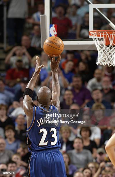 Michael Jordan of the Washington Wizards shoots a free throw against the Phoenix Suns during the game at America West Arena on March 21, 2003 in...