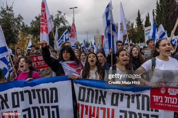Israeli youth, led by Israeli Scouts from Kibbutz Kfar Aza, protest for the release of hostages held in Gaza on December 28, 2023 in Jerusalem,...