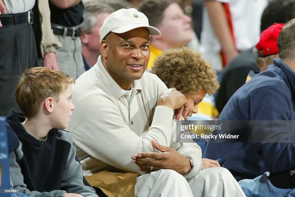 Ronnie Lott watches the game 