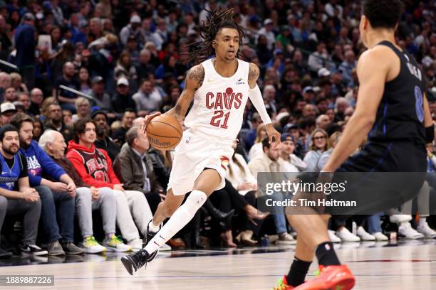 Emoni Bates of the Cleveland Cavaliers dribbles the ball against the Dallas Mavericks in the first half at American Airlines Center on December 27,...