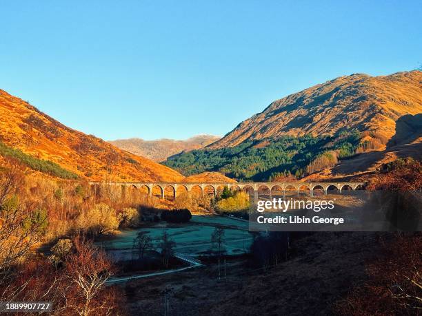 glenfinnan viaduct rail in scotland - history and progress of the steam engine stock pictures, royalty-free photos & images