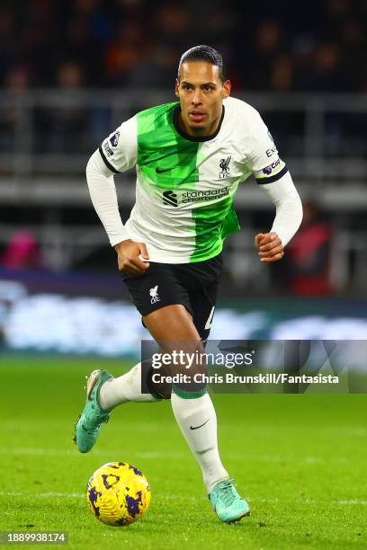 Virgil van Dijk of Liverpool in action during the Premier League match between Burnley FC and Liverpool FC at Turf Moor on December 26, 2023 in...