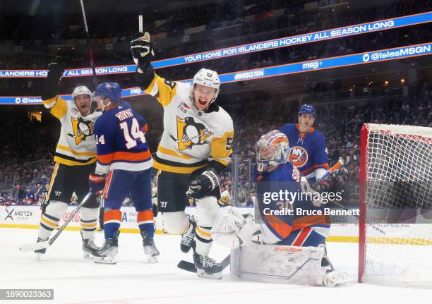 Jake Guentzel of the Pittsburgh Penguins scores a second period goal against Ilya Sorokin of the New York Islanders at UBS Arena on December 27, 2023...