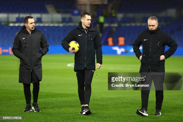 Referee Jarred Gillett inspects the pitch with Assistant Referees Eddie Smart and Darren Cann prior to the Premier League match between Brighton &...