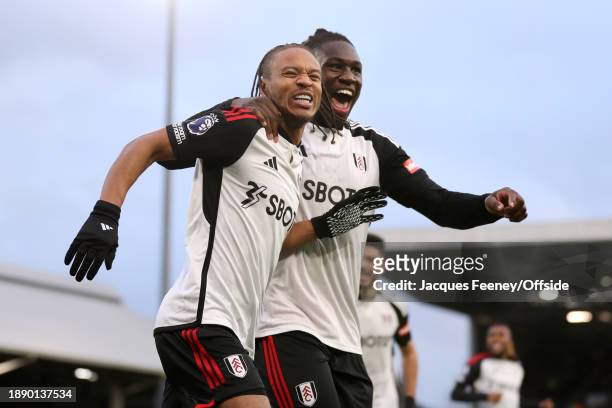 Bobby De Cordova-Reid of Fulham celebrates his goal with Calvin Bassey of Fulham during the Premier League match between Fulham FC and Arsenal FC at...