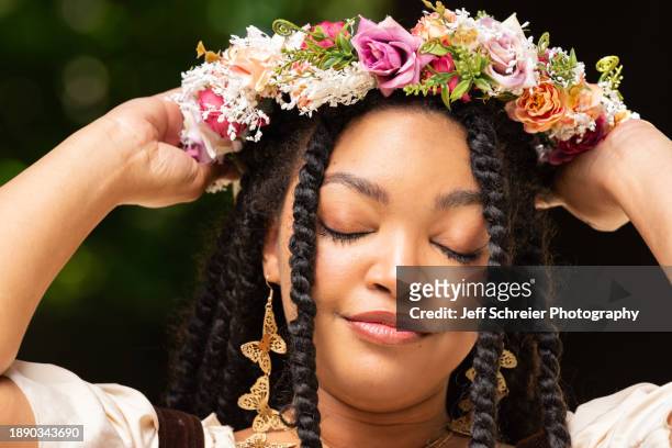 woman with headset - flower crown stock pictures, royalty-free photos & images
