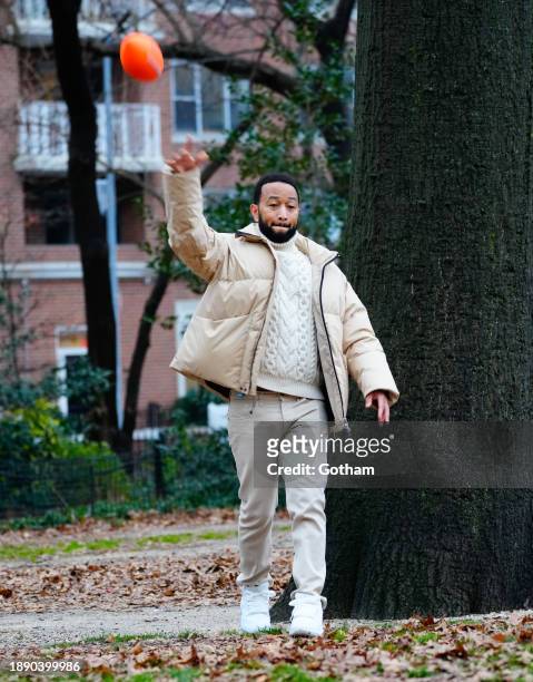 John Legend is seen in Washington Square Park on December 28, 2023 in New York City.