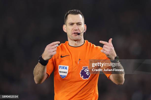 Referee Jarred Gillett gestures during the Premier League match between Brighton & Hove Albion and Tottenham Hotspur at American Express Community...