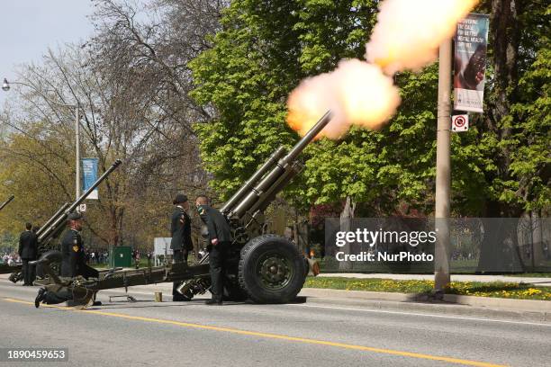 Soldiers from the Canadian military are firing a 21-gun salute during the celebration for the coronation of King Charles III at the Ontario...