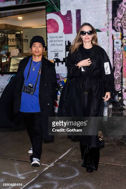 Pax Jolie-Pitt and Angelina Jolie are seen in the East Village on December 28, 2023 in New York City.