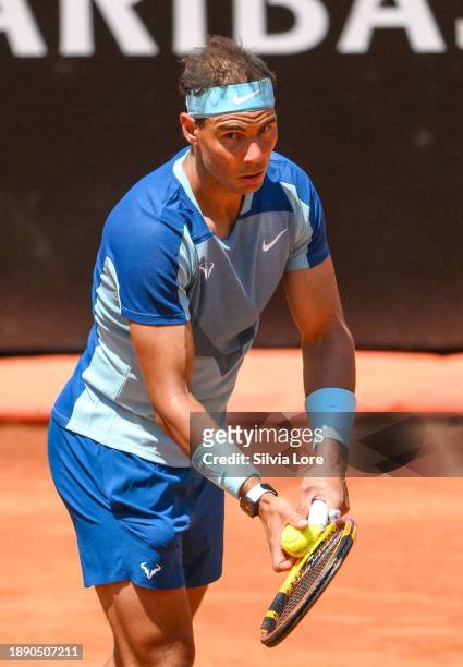 Rafael Nadal of Spain serves to John Isner of USA in their 2nd Round Singles match on day three of the Internazionali BNL D'Italia at Foro Italico on...