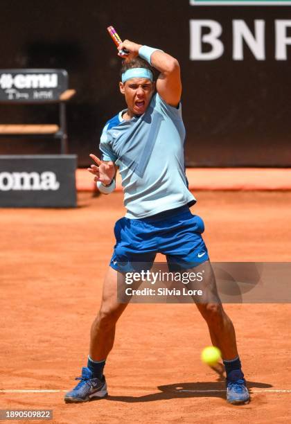 Rafael Nadal of Spain plays a forehand to John Isner of USA in their 2nd Round Singles match on day three of the Internazionali BNL D'Italia at Foro...