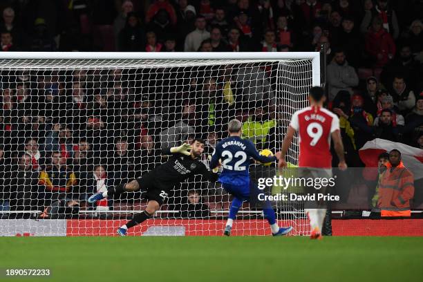 Said Benrahma of West Ham United takes a penalty kick, which is saved by David Raya of Arsenal, during the Premier League match between Arsenal FC...