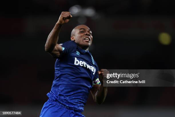 Angelo Ogbonna of West Ham United celebrates in front of West Ham United fans after defeating Arsenal during the Premier League match between Arsenal...