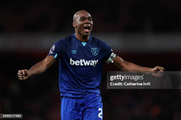 Angelo Ogbonna of West Ham United celebrates in front of West Ham United fans after defeating Arsenal during the Premier League match between Arsenal...